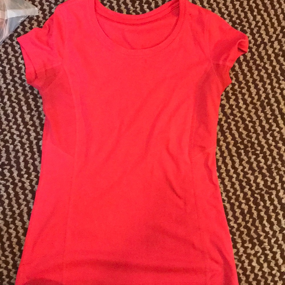Pink athletic shirt